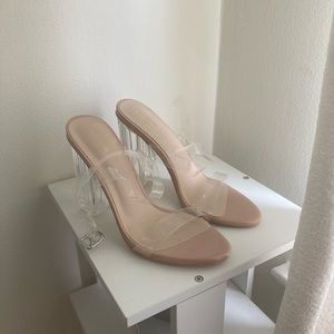 Never worn clear 3.5 inch heeled sandals, with adjustable straps.